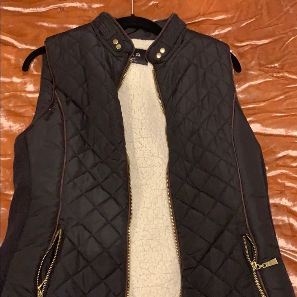 Riding vest with faux fur wool lining